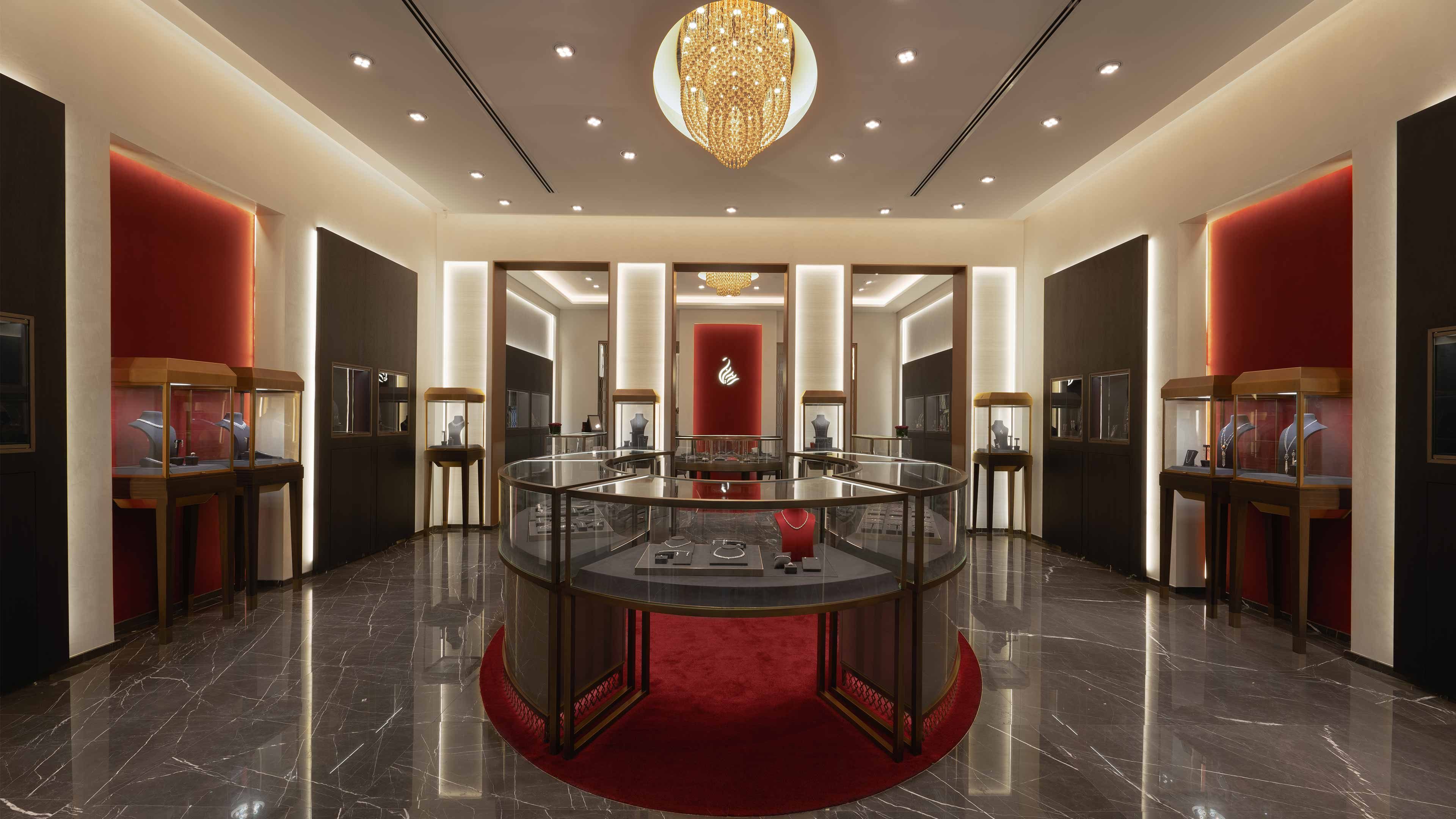 Architectural Lighting Design Luxury Retail Red Brown Interior Jewellery Store Integrated Illumination Ceiling Walls Merchandise Cases Counters Studio N